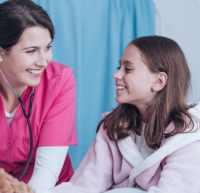 Alfa eCare SignIt Nurse and girl smiling in hospital